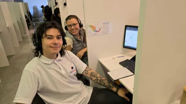 Callnovo agents working at their workstations with headsets